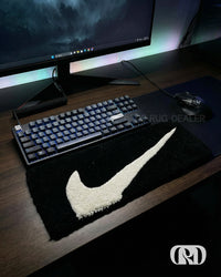 SWOOSH KEYBOARD RUG